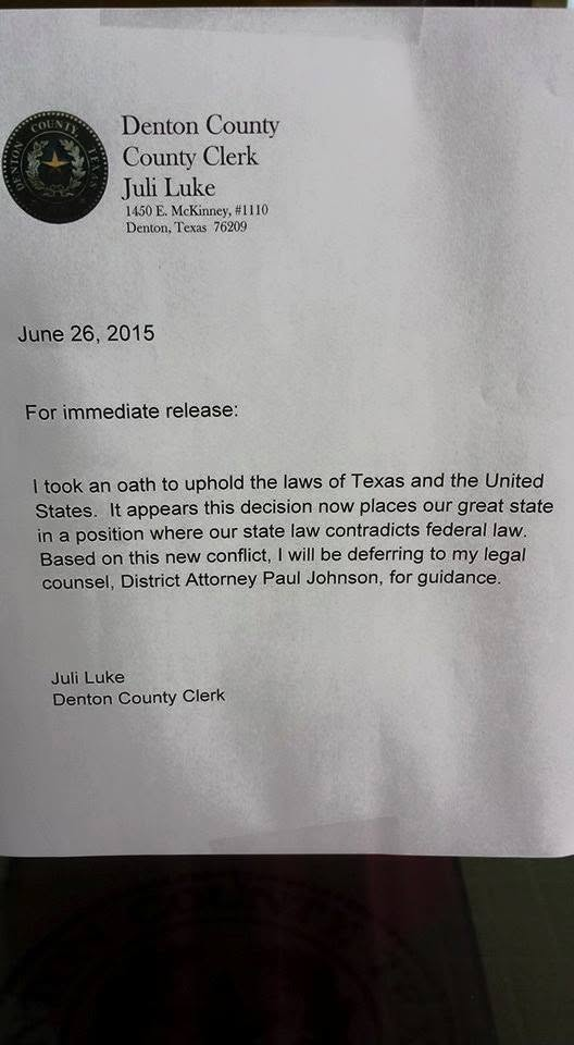 June 26, 2015 statement signed by Denton County Clerk Juli Luke saying she would defer to legal counsel after Texas law conflicted with federal law.